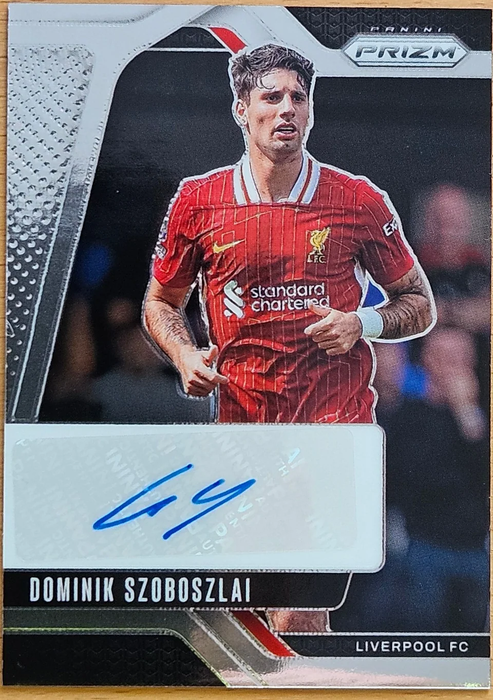 Front of Dominik Szoboszlai's 2024–25 Panini Prizm Premier League Soccer card